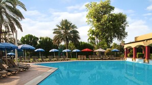 2 outdoor pools, pool umbrellas, sun loungers - Hilton Fujairah Resort (Al-Fujairah)