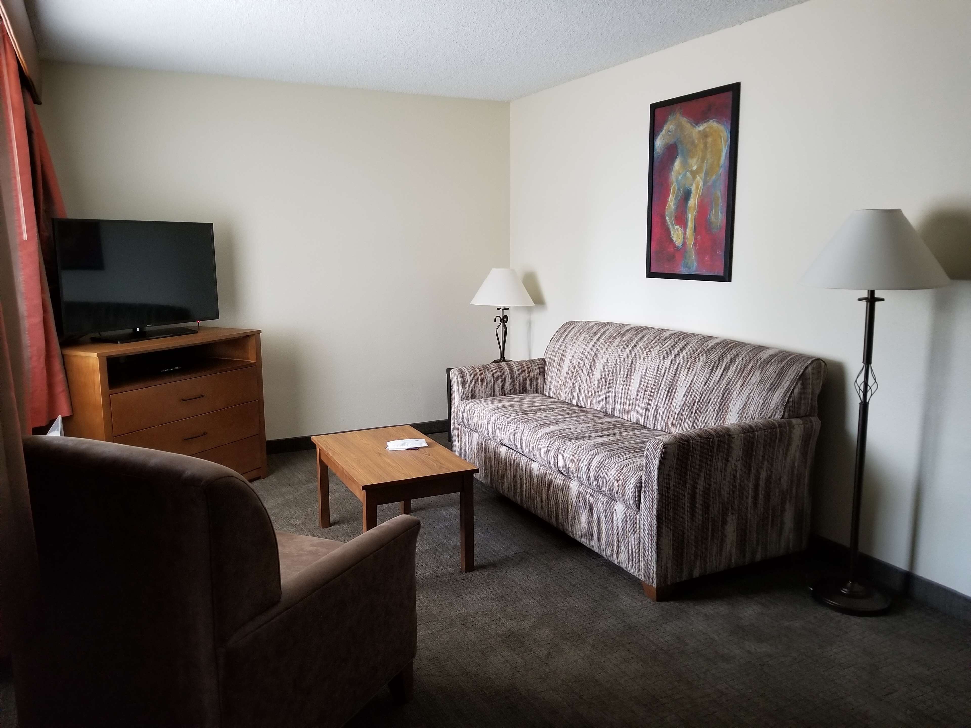 suite, 2 queen beds, non smoking, refrigerator & microwave (with sofabed) | 1 bedroom, desk, laptop workspace, iron/ironing board