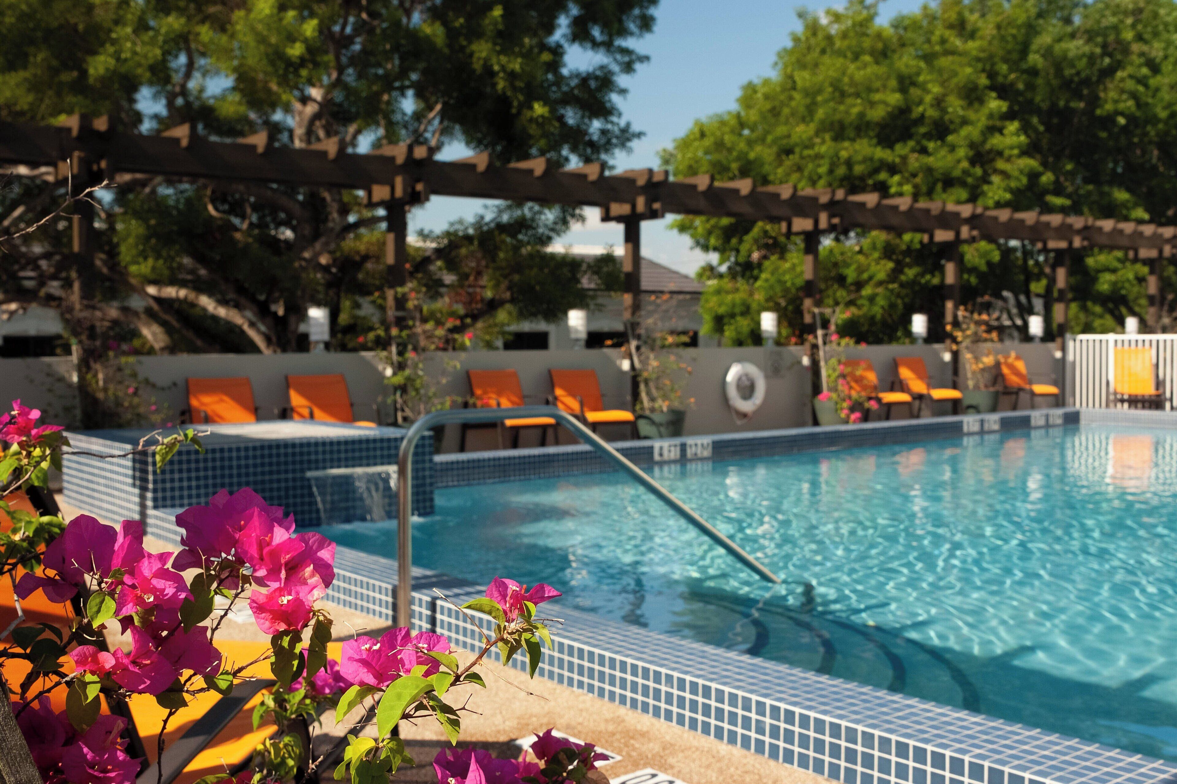 outdoor pool, open 6:30 am to 8:00 pm, pool loungers