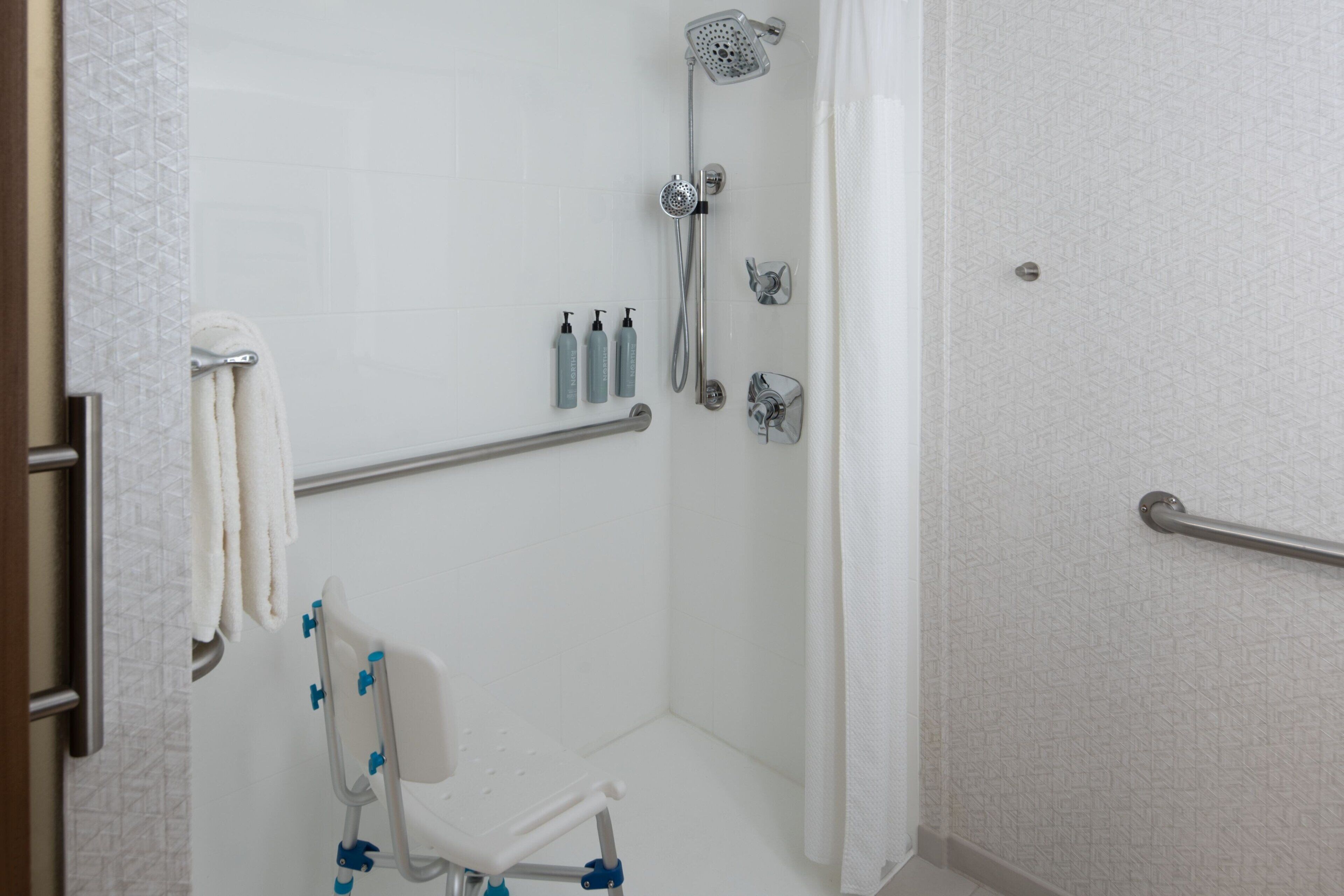 combined shower/bathtub, free toiletries, hair dryer, towels