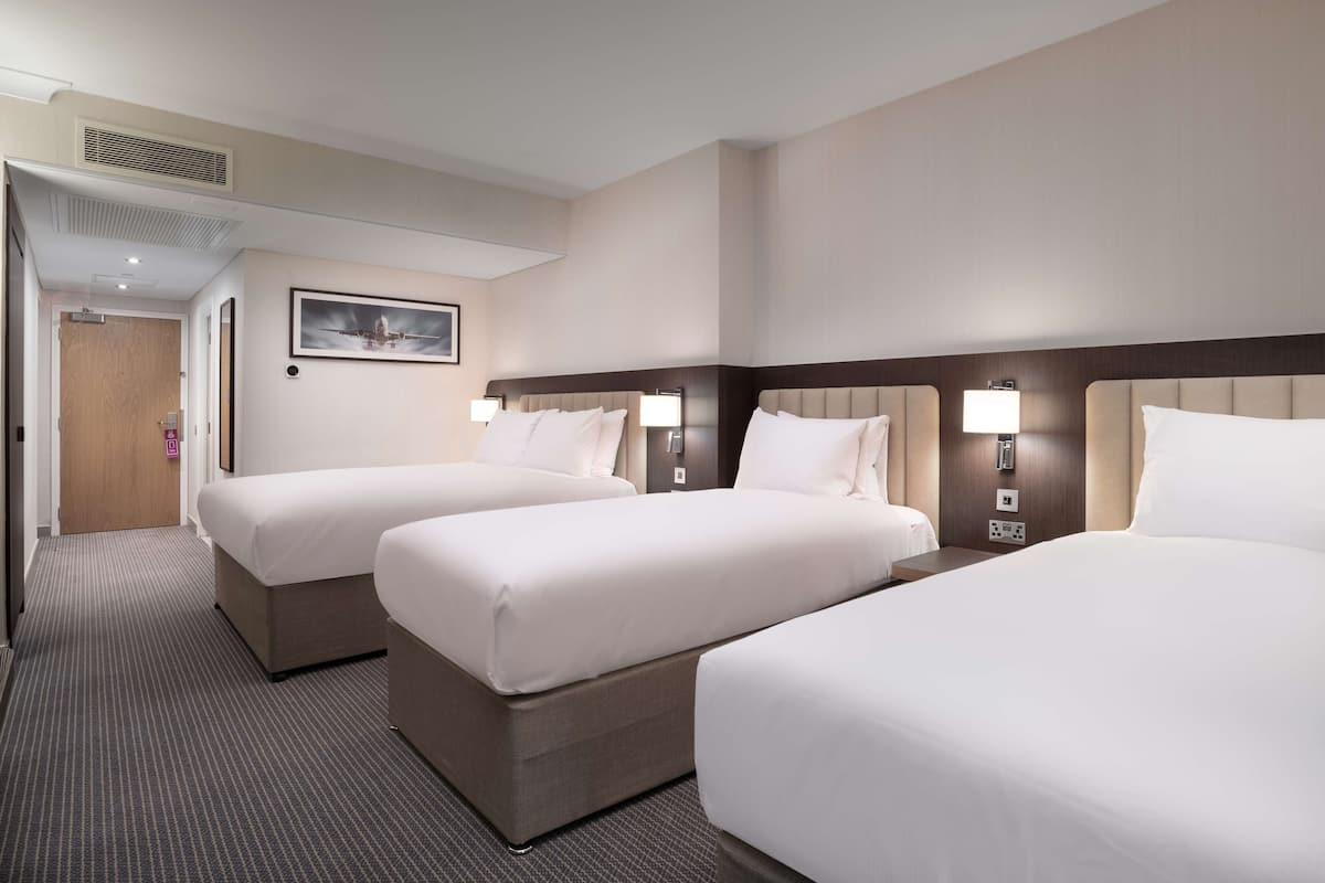 Family Room, Multiple Beds | 1 bedroom, premium bedding, in-room safe, desk