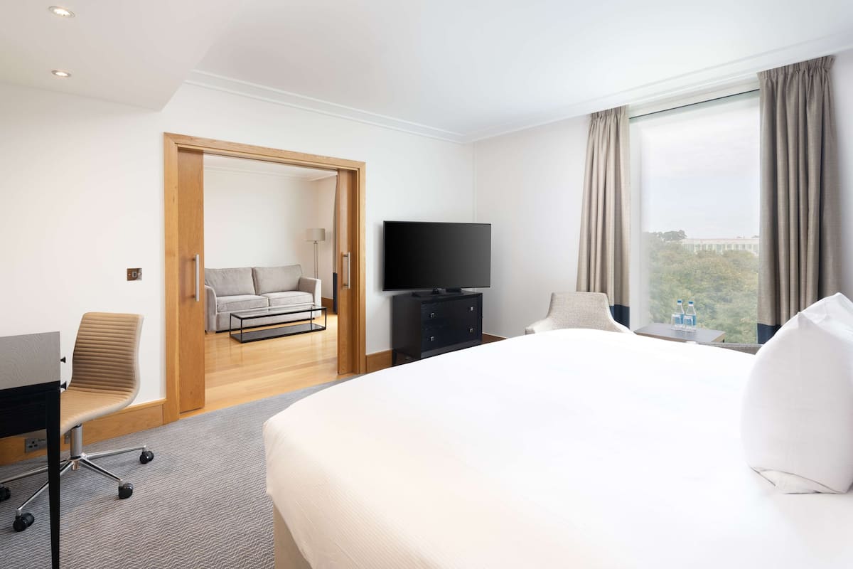 Suite, 1 King Bed | 1 bedroom, premium bedding, in-room safe, desk