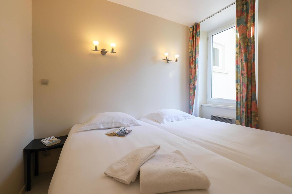 Desk, free WiFi, bed sheets, alarm clocks