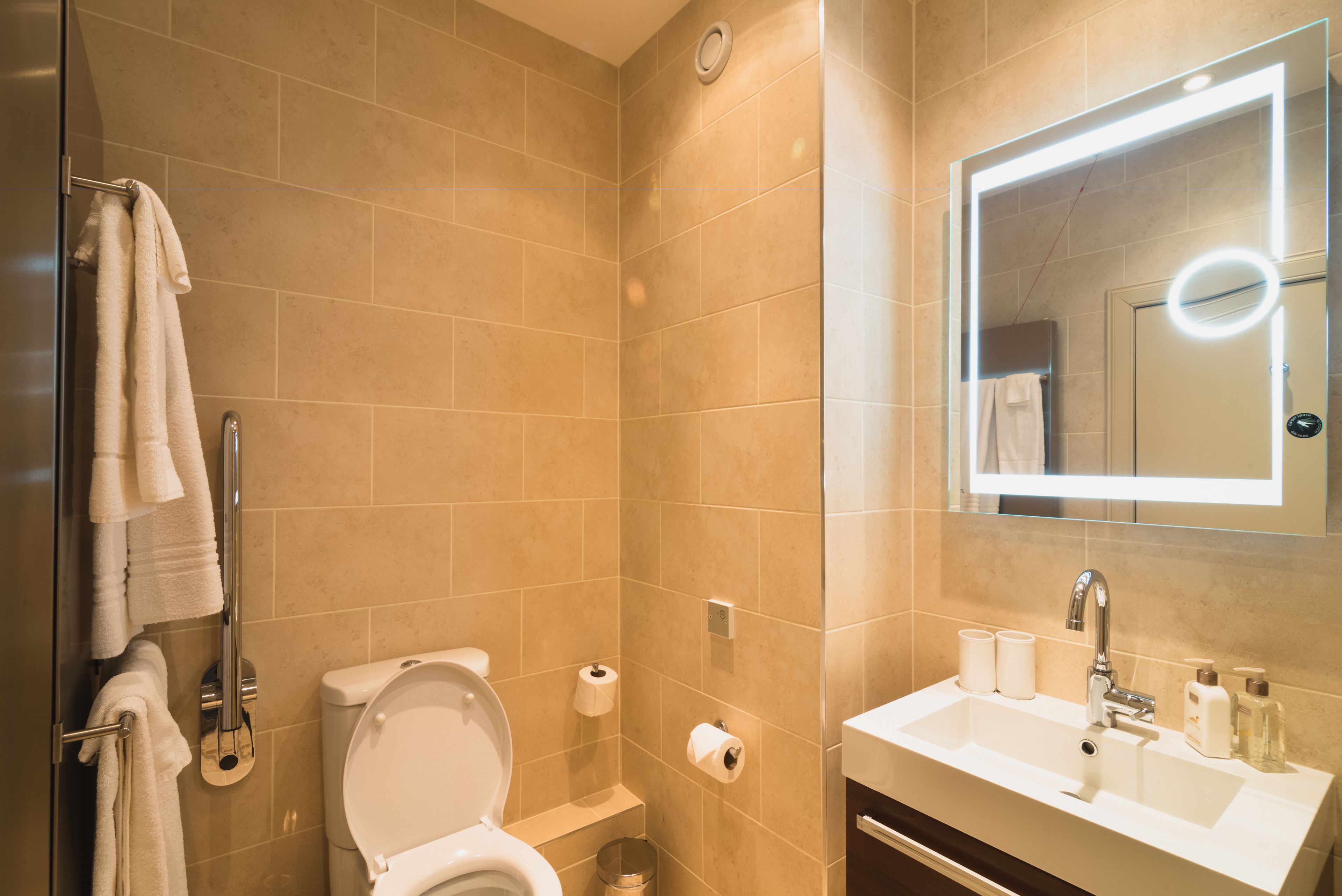 combined shower/bathtub, free toiletries, hair dryer, bathrobes