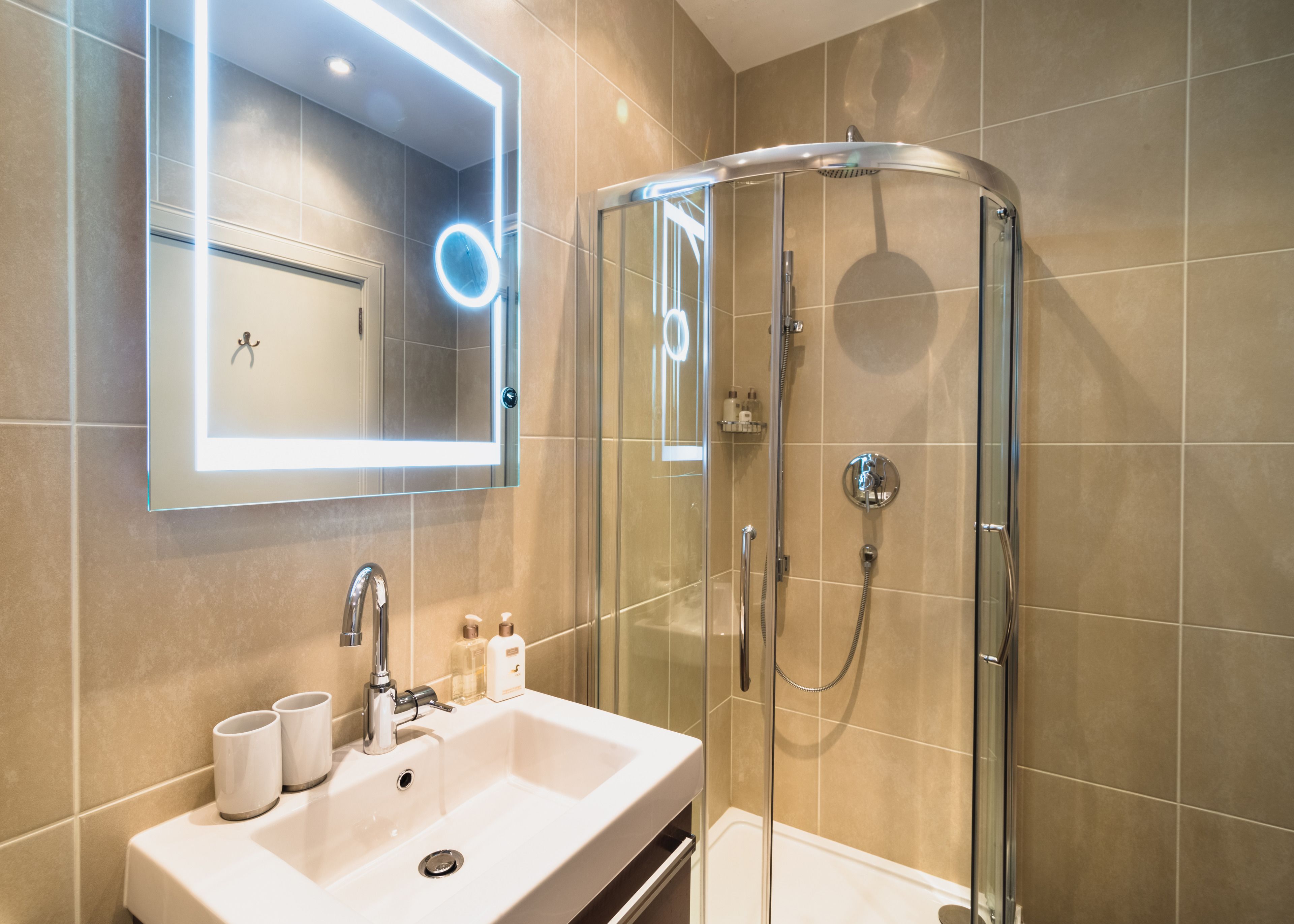 combined shower/bathtub, free toiletries, hair dryer, bathrobes