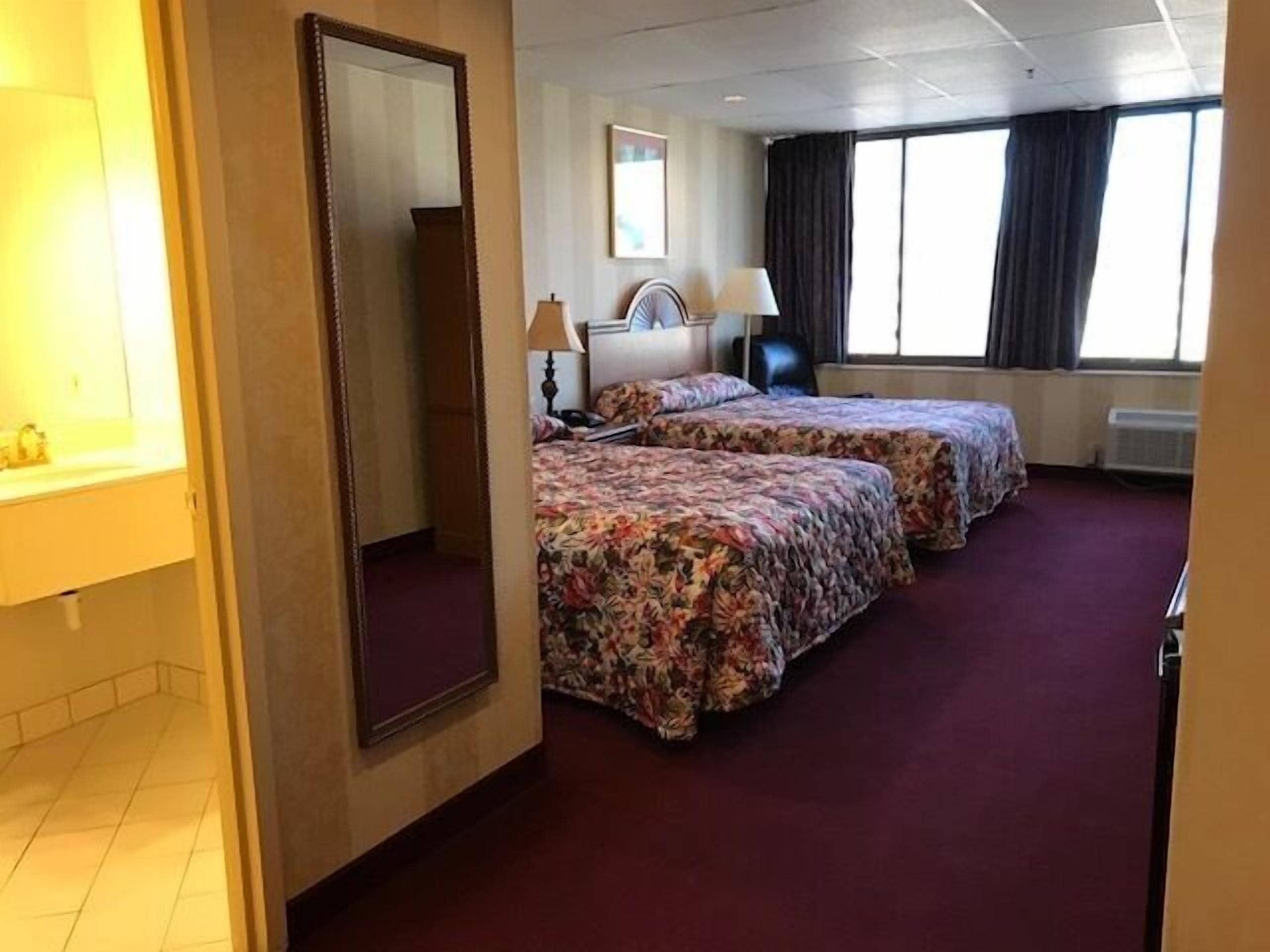 standard room, 2 queen beds | desk, soundproofing, iron/ironing board, cots/infant beds