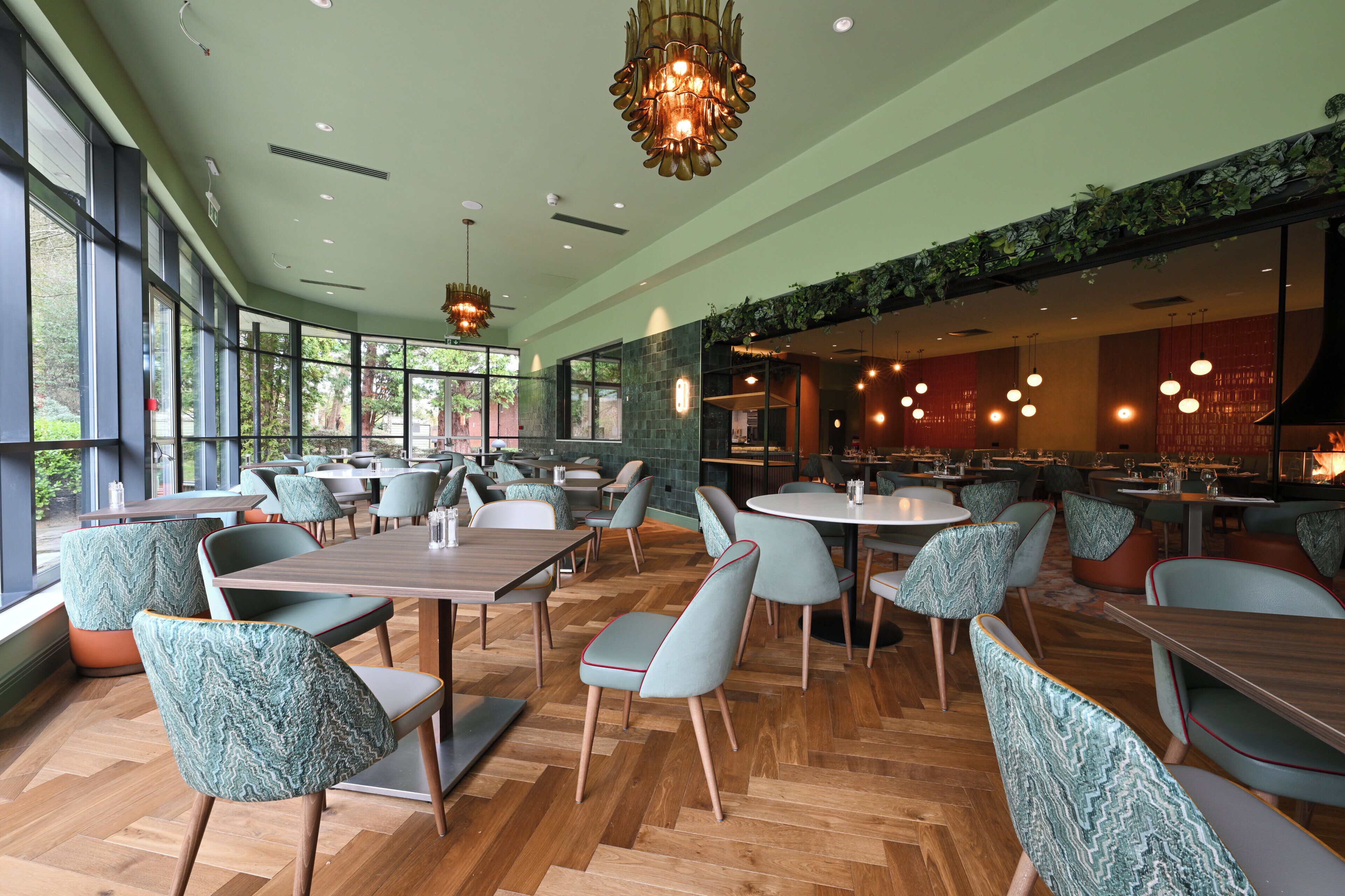 Breakfast, lunch, dinner served; Modern European cuisine, garden views 