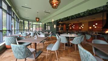 Breakfast, lunch, dinner served; Modern European cuisine, garden views