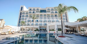 Outdoor pool, open 8:00 AM to 8:00 PM, pool umbrellas, sun loungers