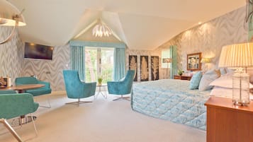 Deluxe Room, 1 King Bed, Balcony | In-room safe, desk, blackout drapes, iron/ironing board