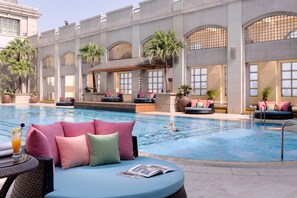 Outdoor pool, open 6:30 AM to 9:30 PM, pool loungers