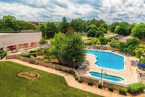 Seasonal outdoor pool, open 9:00 AM to 11:00 PM, pool umbrellas