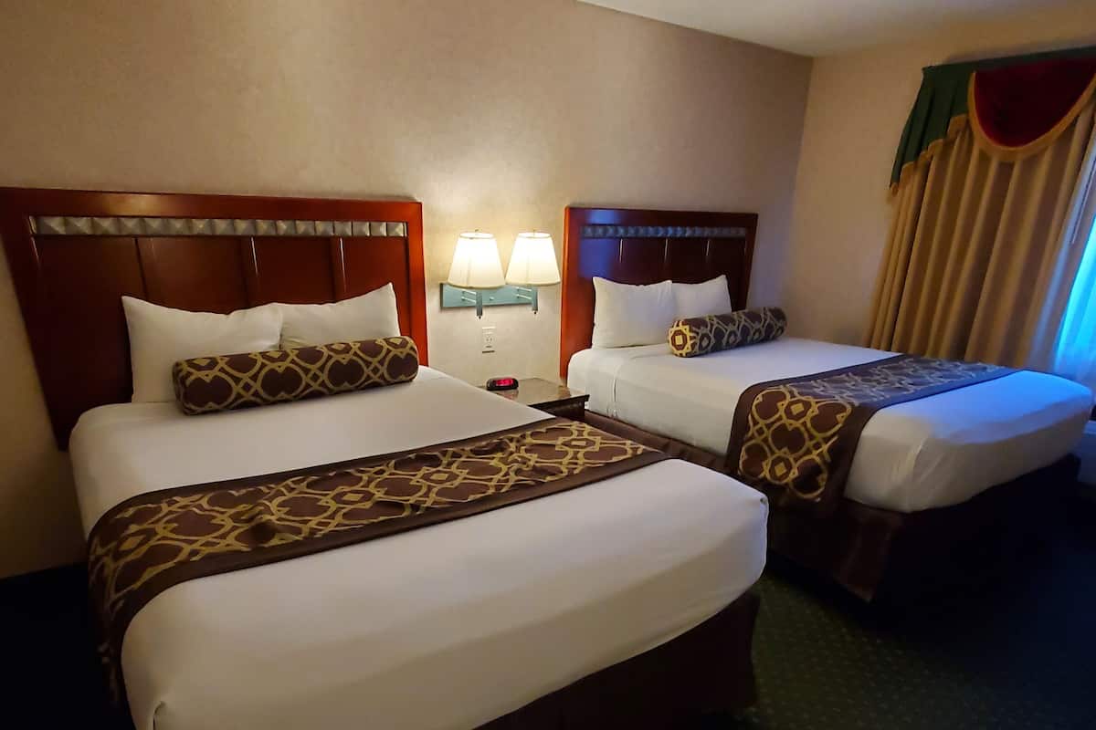 Standard Room, 2 Queen Beds, Non Smoking | In-room safe, desk, iron/ironing board, free WiFi