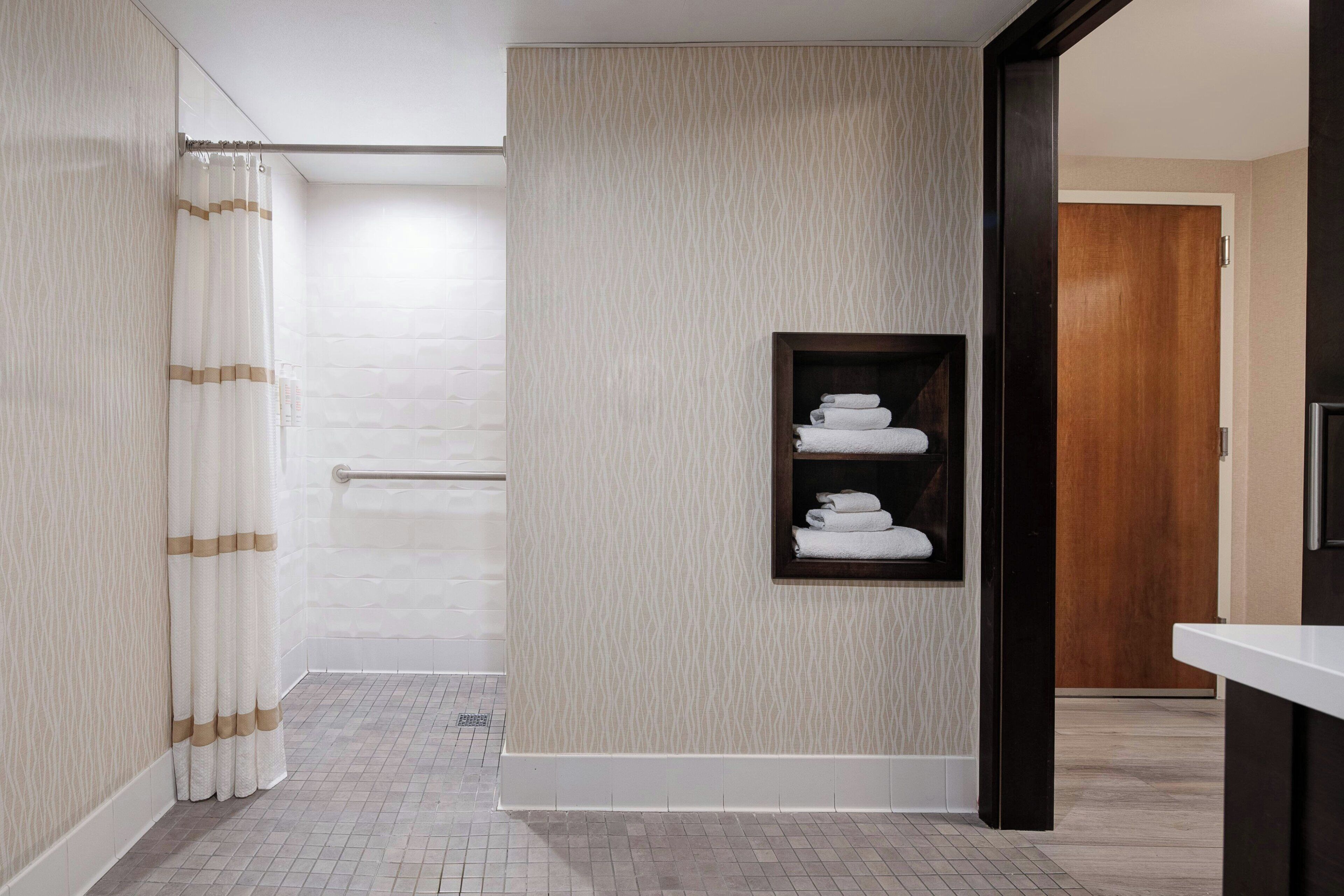 combined shower/bathtub, free toiletries, hair dryer, towels