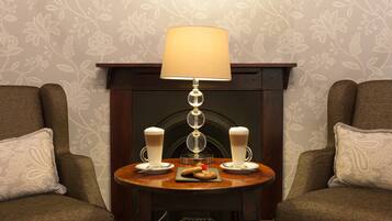 Suite, 1 King Bed, Non Smoking | Living area | Flat-screen TV, iPod dock