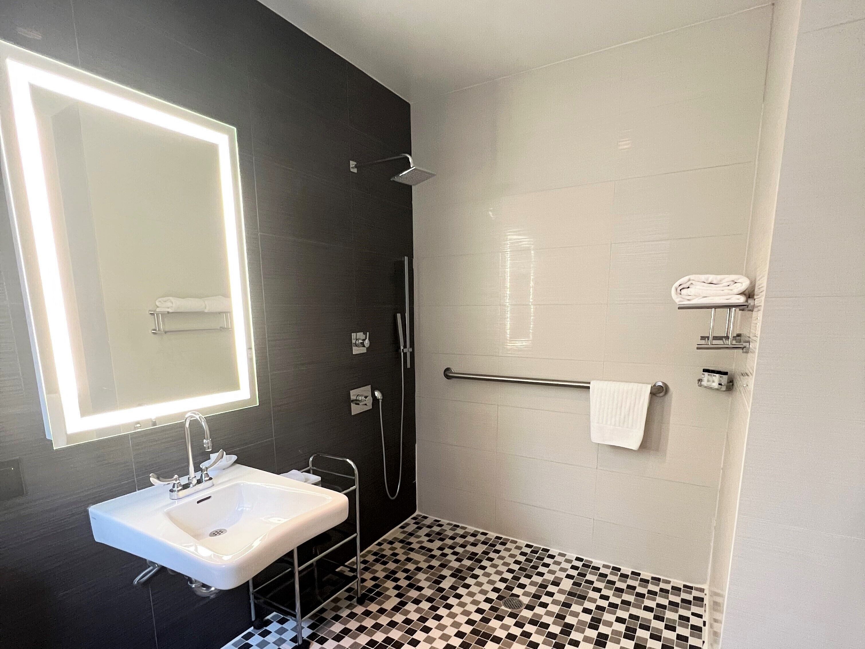 shower, rainfall showerhead, designer toiletries, hair dryer