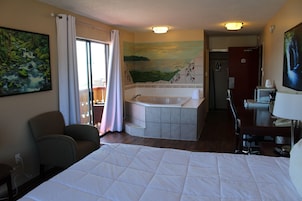 Superior Studio Suite, 1 King Bed, Non Smoking, Ocean View | Desk, iron/ironing board, WiFi (free), alarm clocks