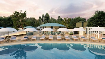 Seasonal outdoor pool, open 7:00 AM to 10:00 PM, pool umbrellas