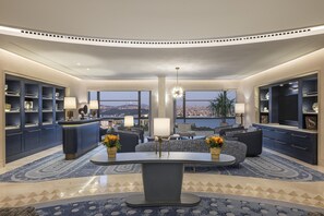 Imperial Suite | Living area | 55-inch TV with digital channels, toys, books - Hilton Istanbul Bosphorus (Istanbul)