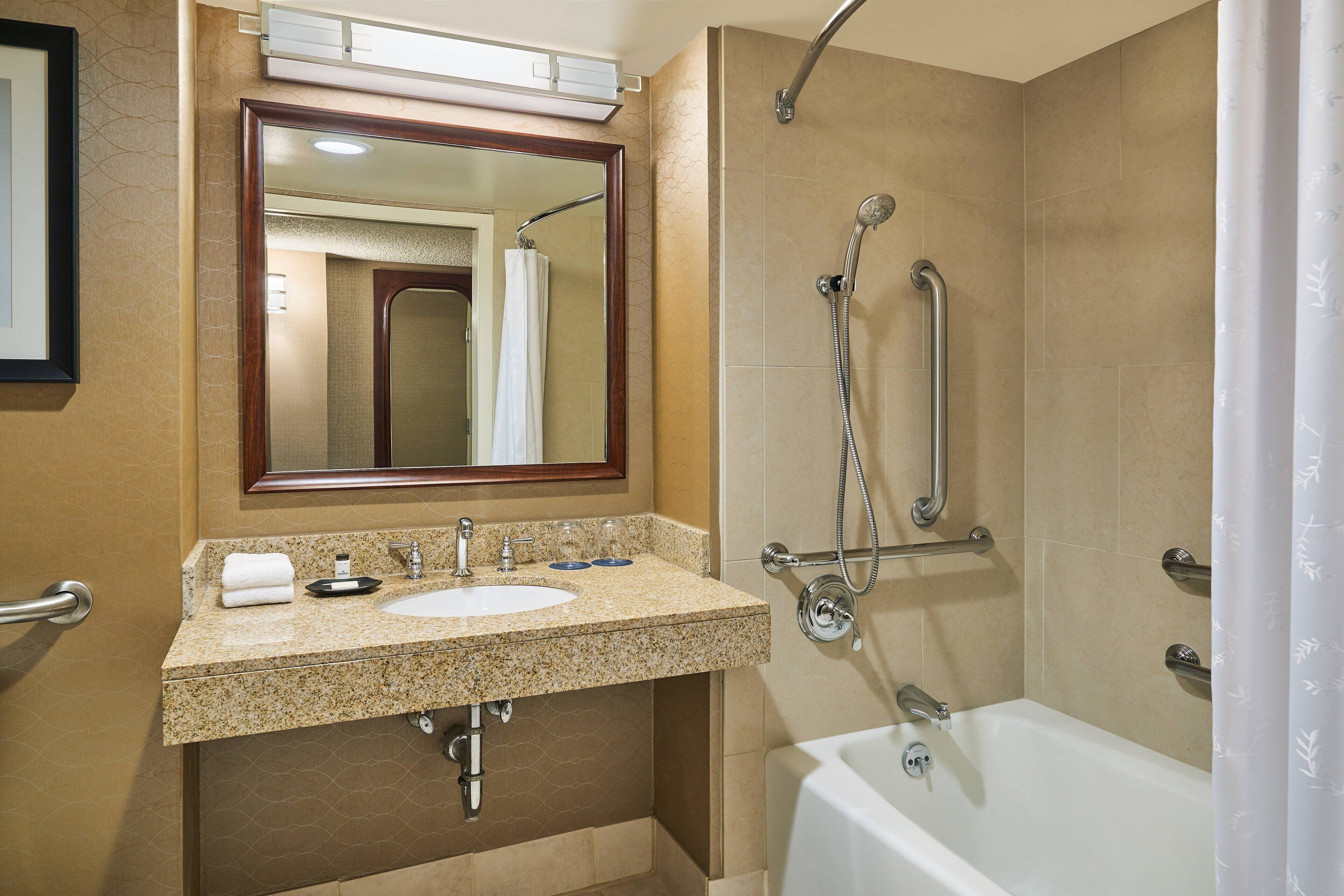 combined shower/bathtub, free toiletries, hair dryer, towels