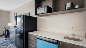 A compact kitchenette with a refrigerator, microwave, dishwasher, and a sink. - Best Western Shepherdsville-Louisville South Hotel (Shepherdsville)