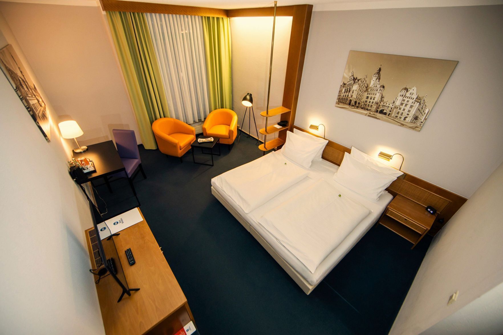 Hypo-allergenic bedding, desk, laptop workspace, blackout curtains