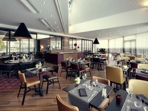 Breakfast, lunch, dinner served; Fusion cuisine, pool views 