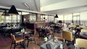 Breakfast, lunch, dinner served; Fusion cuisine, pool views