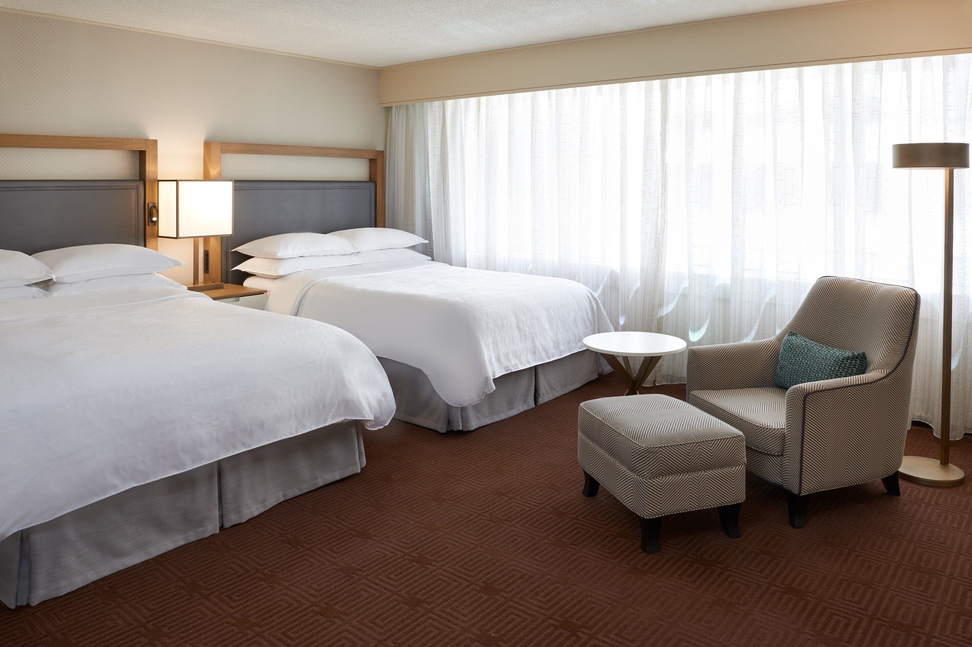 hypo-allergenic bedding, pillow-top beds, in-room safe, desk