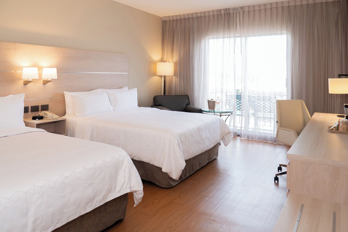 Standard Room, 2 Queen Beds, Ground Floor | In-room safe, desk, iron/ironing board, cribs (free)