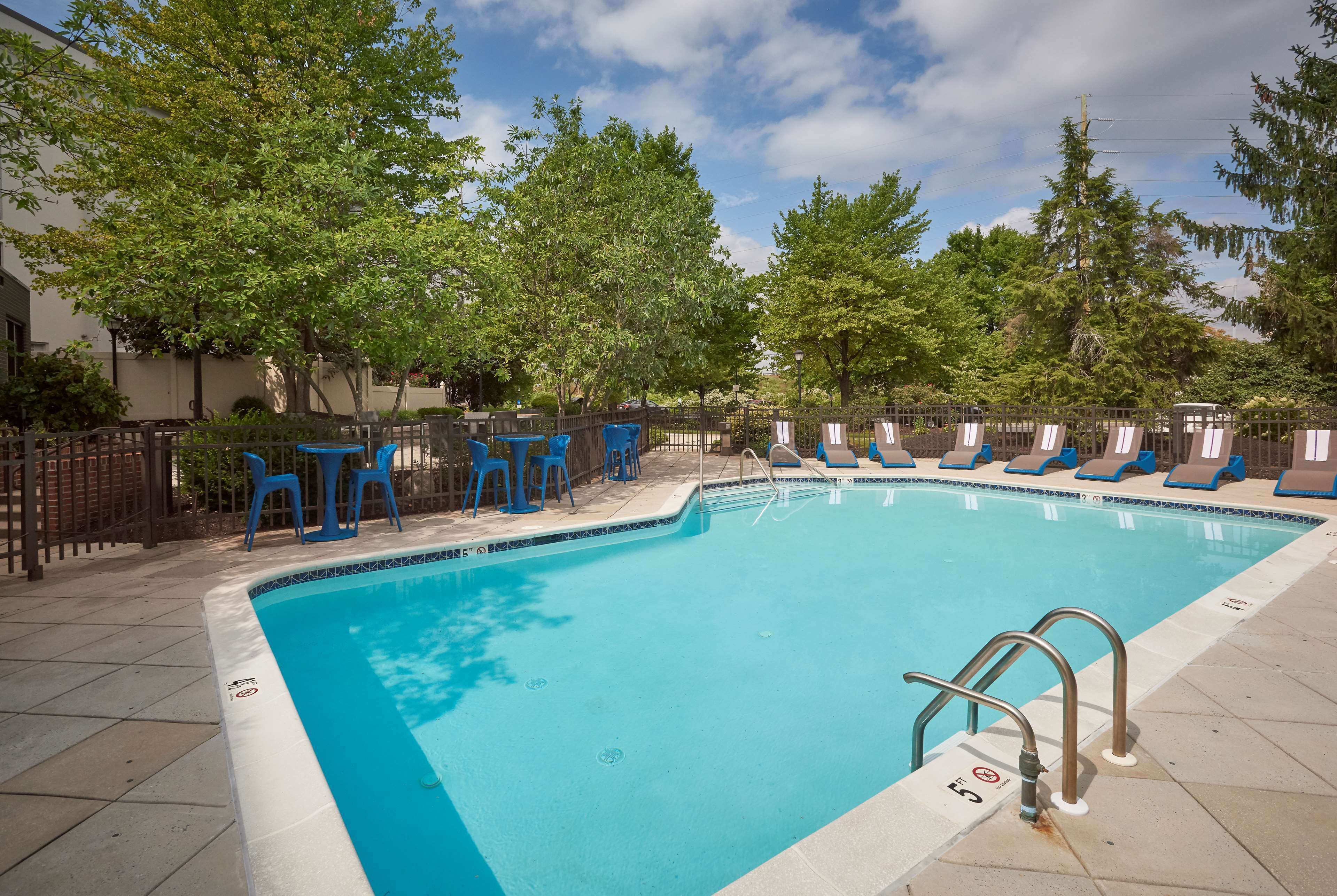 seasonal outdoor pool, open 8:00 am to 9:00 pm, pool loungers