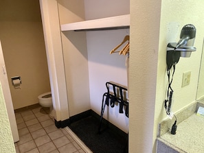 Suite, 1 King Bed, Smoking | Bathroom | Hair dryer, towels