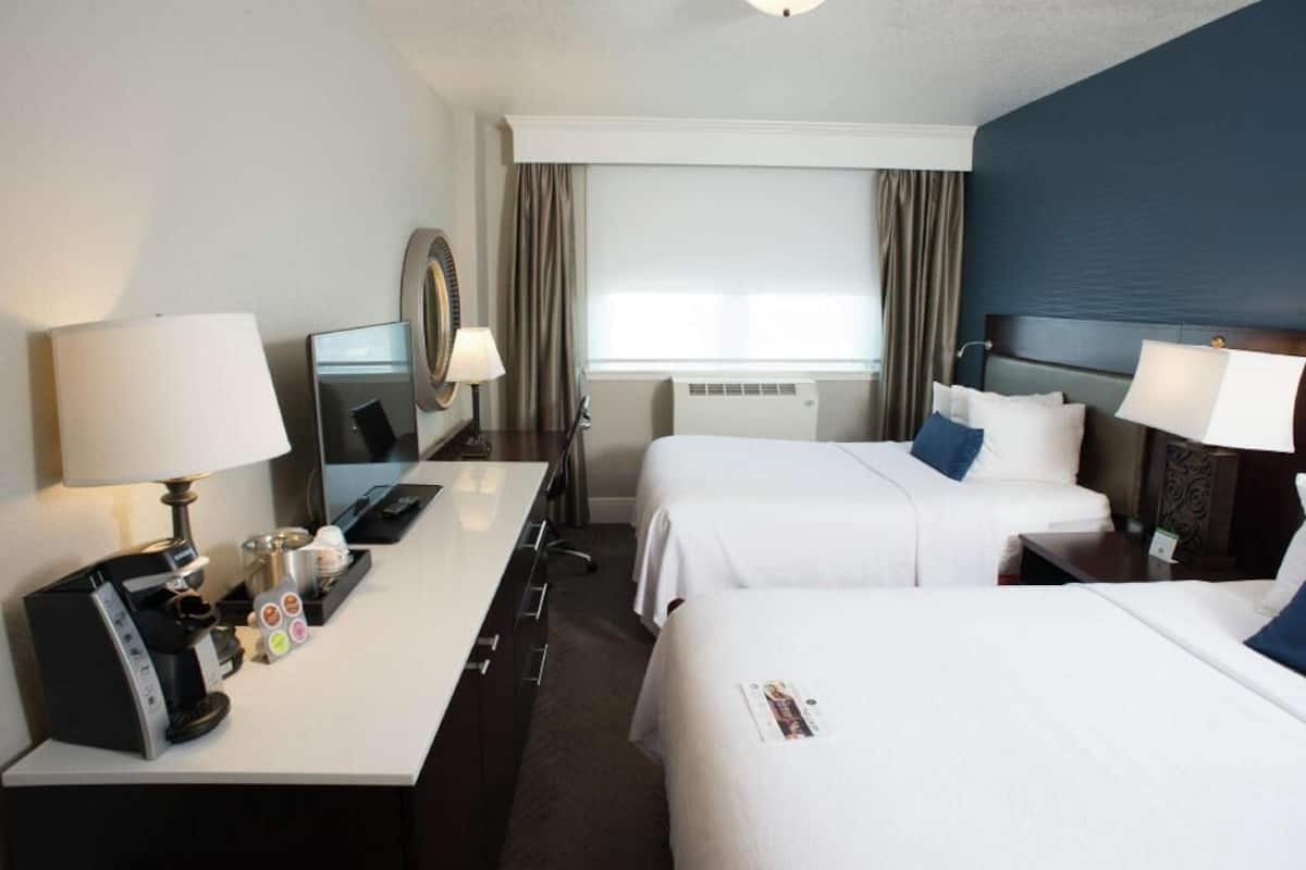 Premium bedding, pillow-top beds, in-room safe, blackout curtains