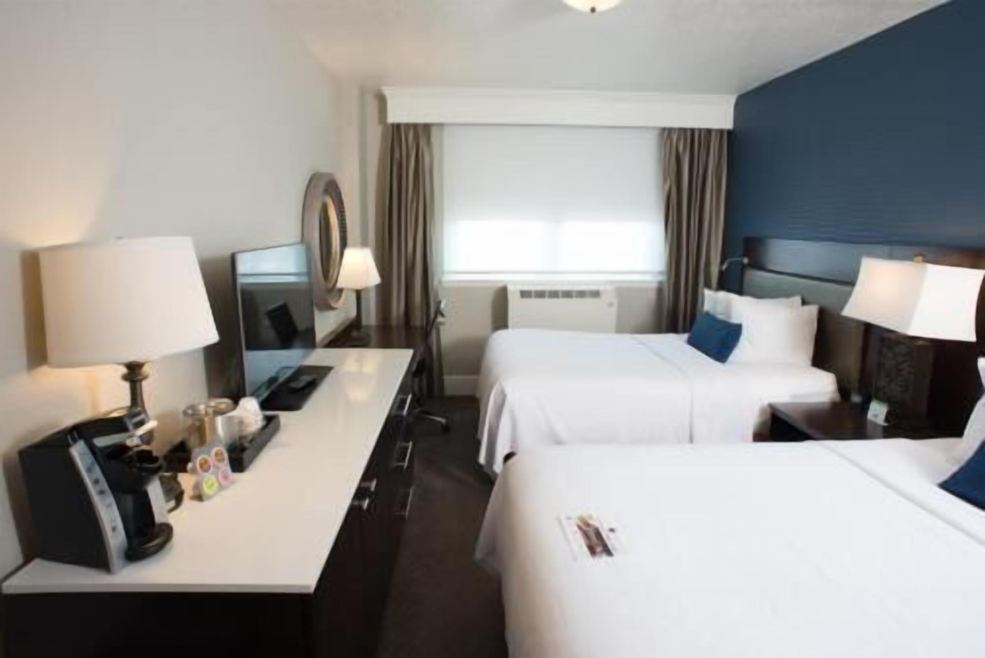 Premium bedding, pillowtop beds, in-room safe, blackout drapes