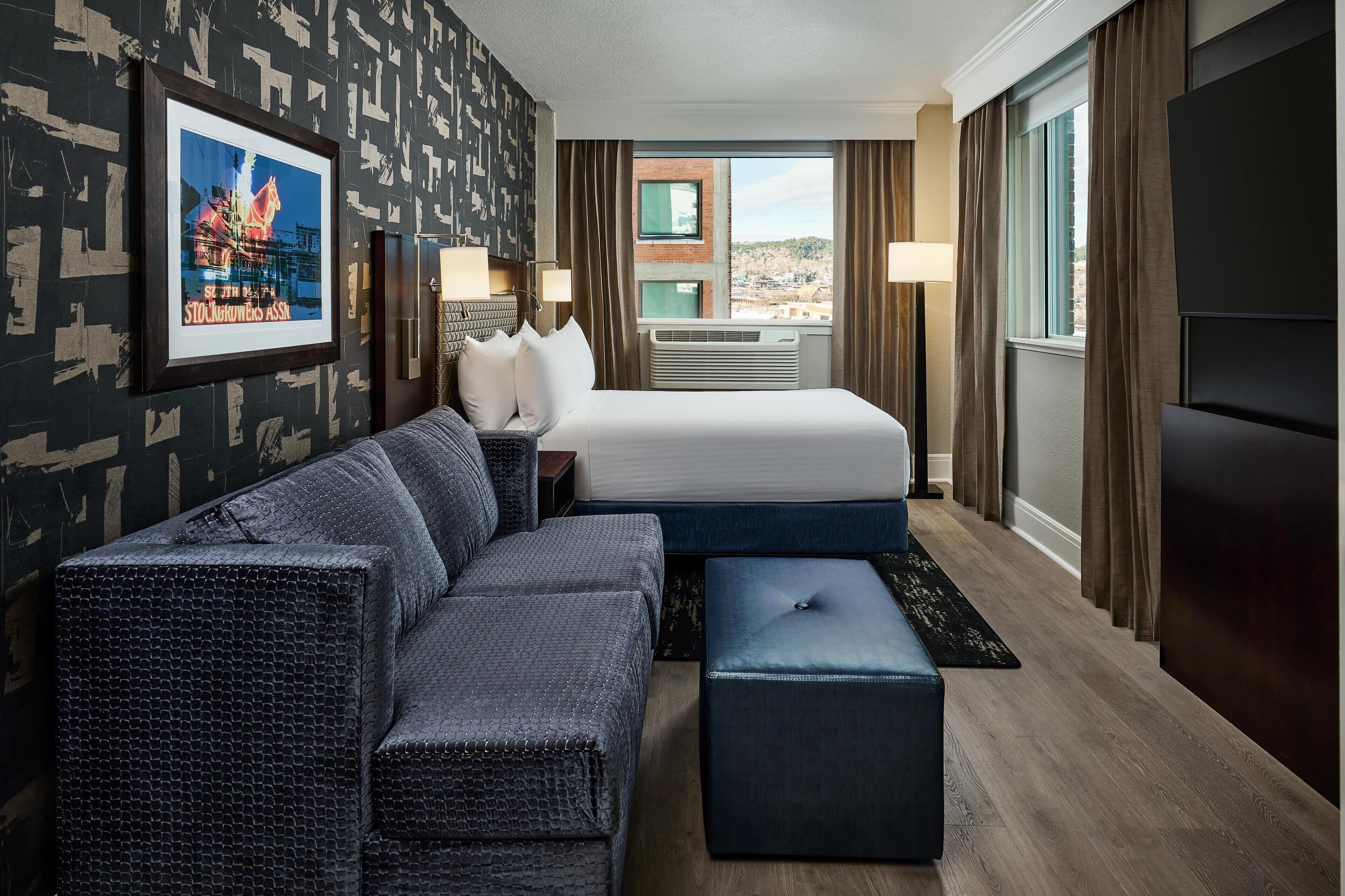 Premium bedding, pillowtop beds, in-room safe, blackout drapes