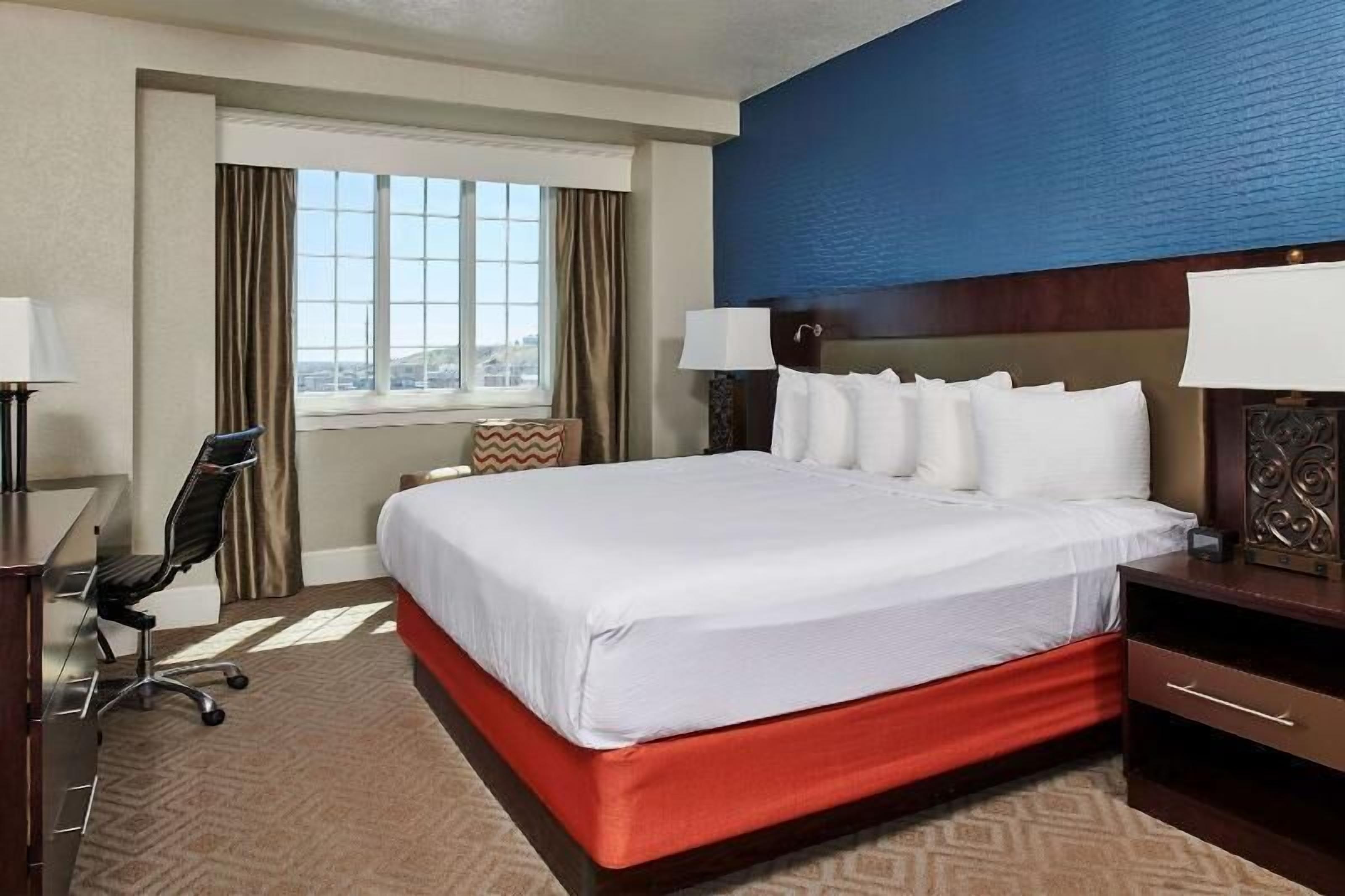 Premium bedding, pillowtop beds, in-room safe, blackout drapes