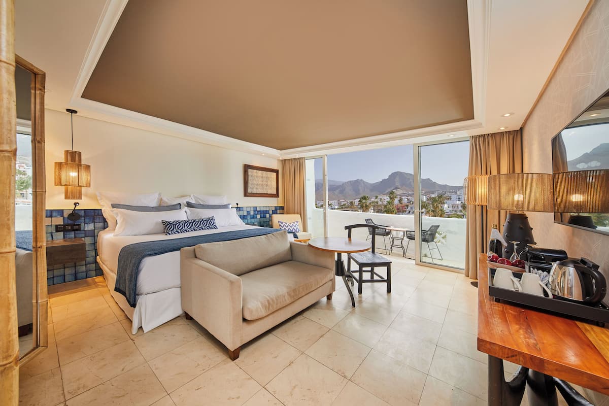 1 kamar tidur, selimut bulu angsa, busa memori, dan minibar