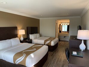 Standard Room, 2 Queen Beds, Non Smoking | 1 bedroom, desk, laptop workspace, blackout drapes