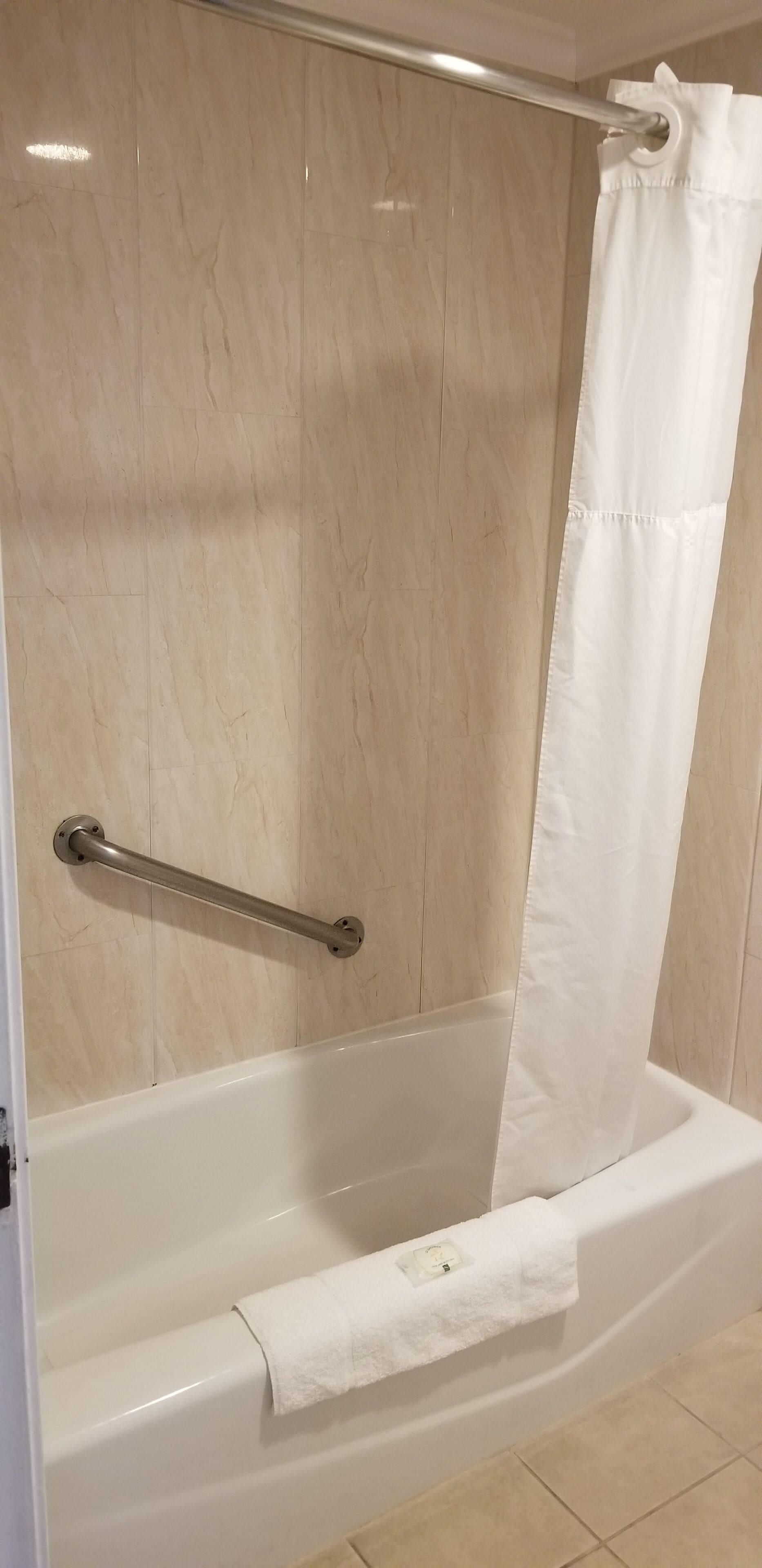 combined shower/bathtub, free toiletries, hair dryer, towels