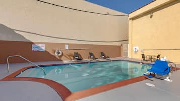 Outdoor pool, open 10:00 AM to 8:00 PM, pool umbrellas, pool loungers