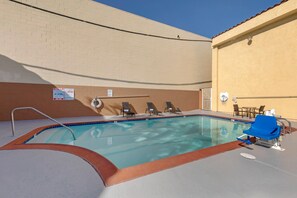 Outdoor pool, open 10:00 AM to 8:00 PM, pool umbrellas, pool loungers