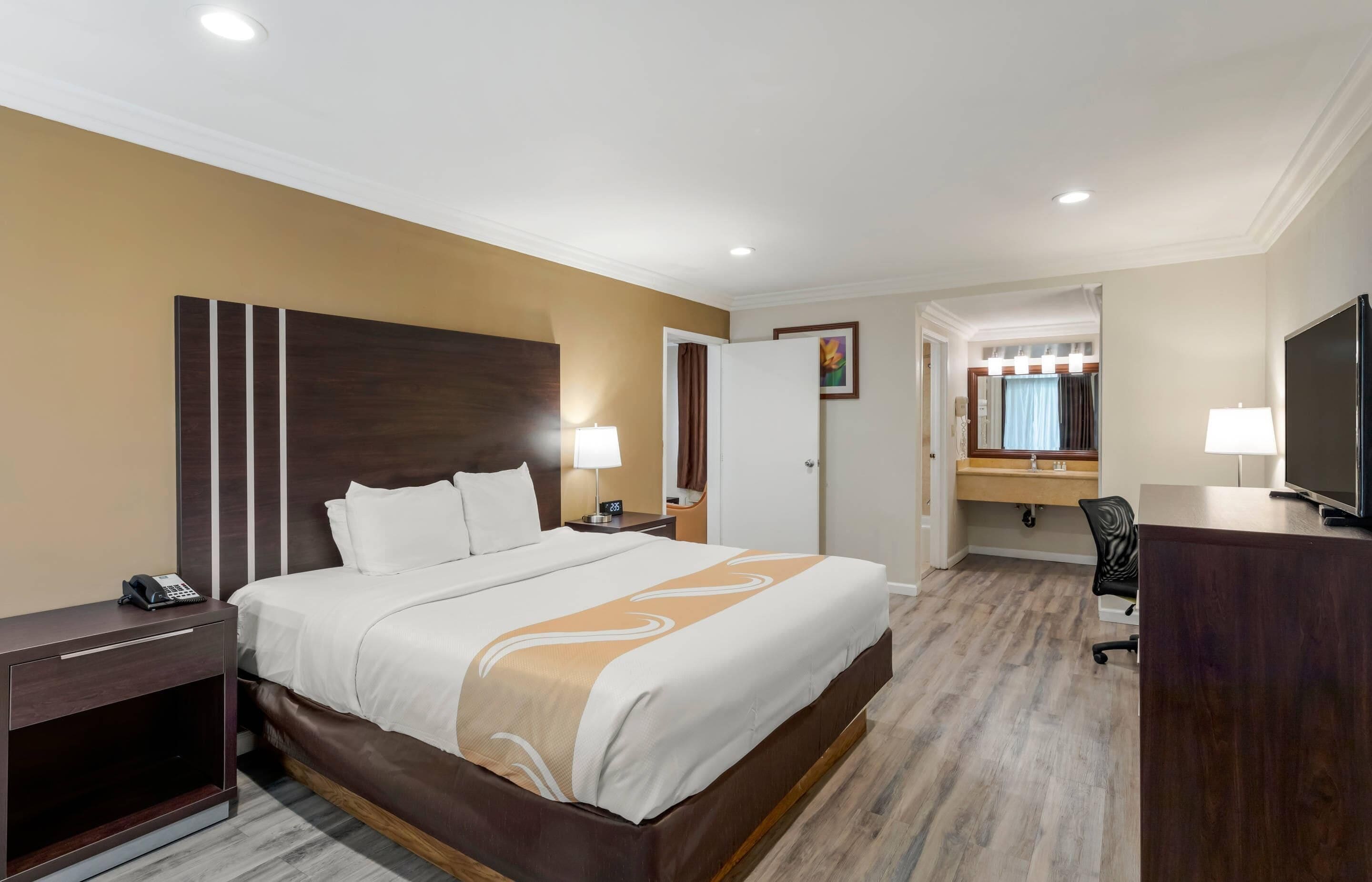 1 bedroom, desk, laptop workspace, blackout curtains