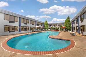 Seasonal outdoor pool, pool umbrellas