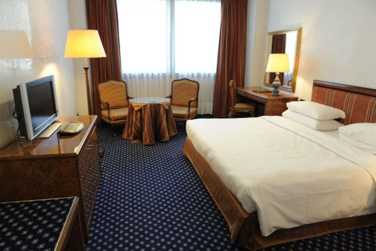 Down duvets, minibar, in-room safe, desk