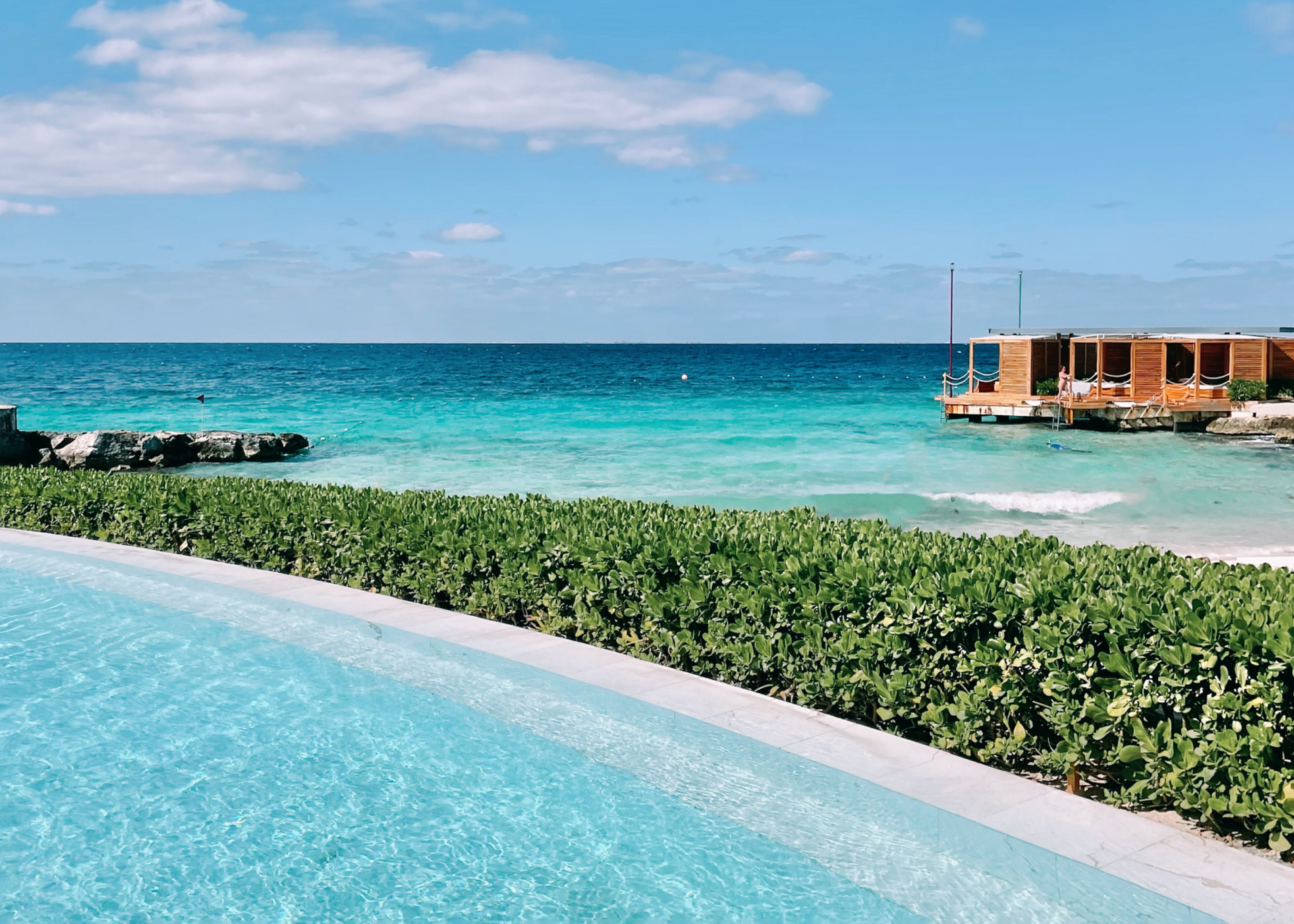 2 outdoor pools, pool umbrellas