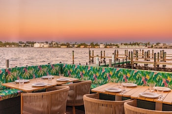 Lunch and dinner served at Palm Tree Club Miami Hotel