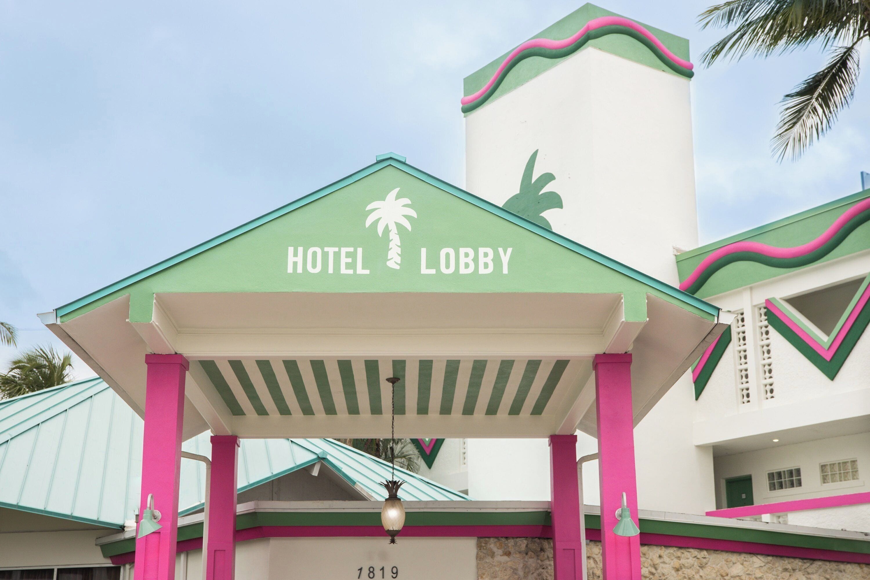 A hotel lobby with a sign reading "HOTEL LOBBY" and the number "1819" below it.