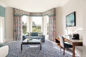 Suite, 1 King Bed | 1 bedroom, premium bedding, minibar, in-room safe