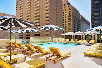 Outdoor pool, open 6:00 AM to midnight, cabanas (surcharge) at The Adolphus, Autograph Collection