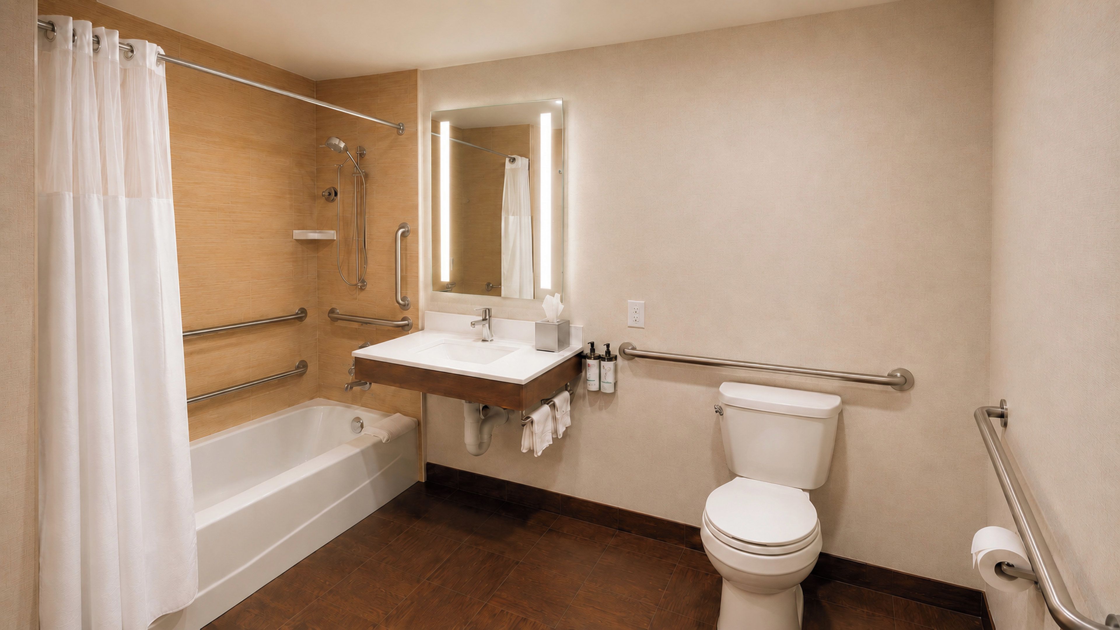 A bathroom with a bathtub, a toilet, a sink, and a shower.